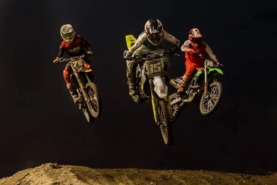 Motocross riders racing action